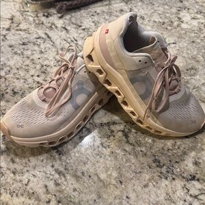 On Cloud Beige and Pink Athletic Sneakers